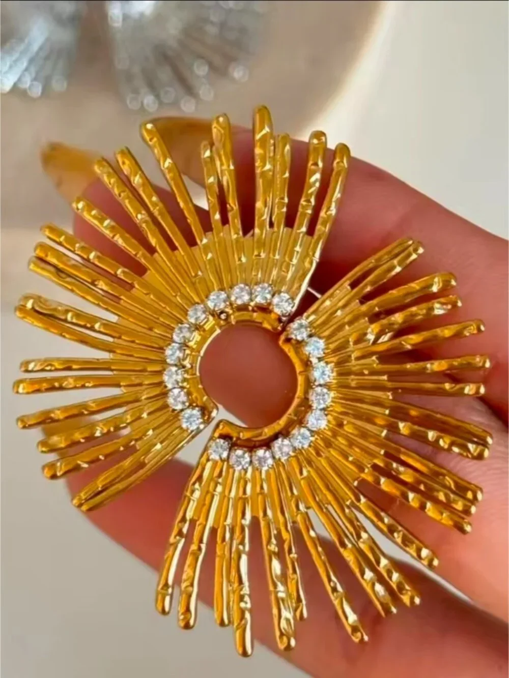 Radiant Gold Sunburst Earrings with Crystal Accents